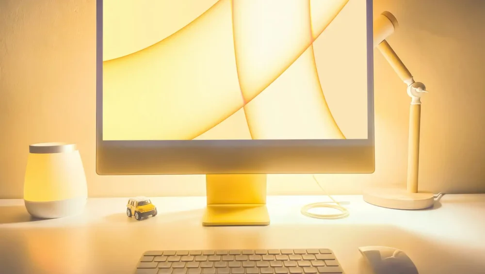 Yellow Apple iMac on Desk